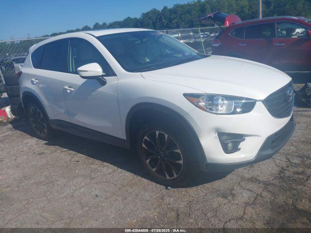  Salvage Mazda Cx